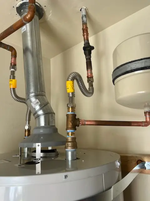 Water heater installation and plumbing repair in Clover Park