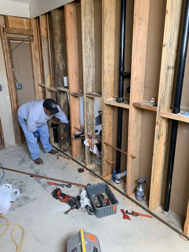 Commercial rough-in plumbing for Water Heater Replacement in Clover Park